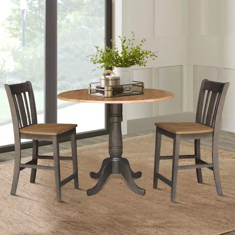 3-delige ronde eetkamerset van 42" voor barhoogte, met twee neerklapbare tafelbladen en 2 barkrukken met splatrugleuning, Hickory/gewassen steenkool - International Concepts