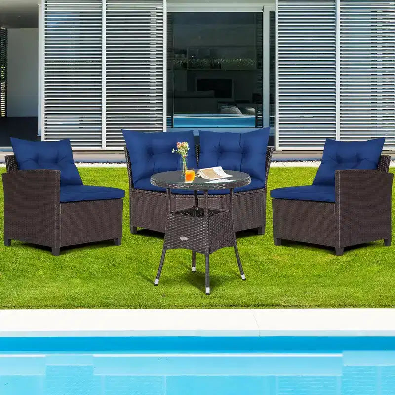 Costway 4-delige rotan tuinmeubelset met zitbank, kussens en glazen tafel voor de tuin